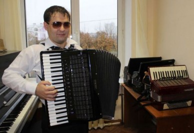 Слепой музыкант попросил у Путина аккордеон